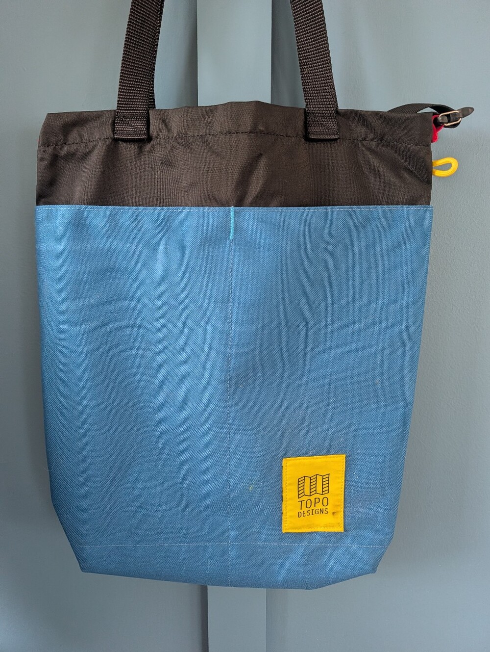 Topo Designs Blue and Black Messenger Tote with Yellow Logo Patch